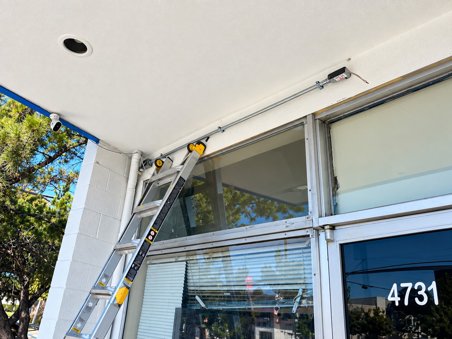 Outdoor security camera installation in progress at Sacramento commercial property