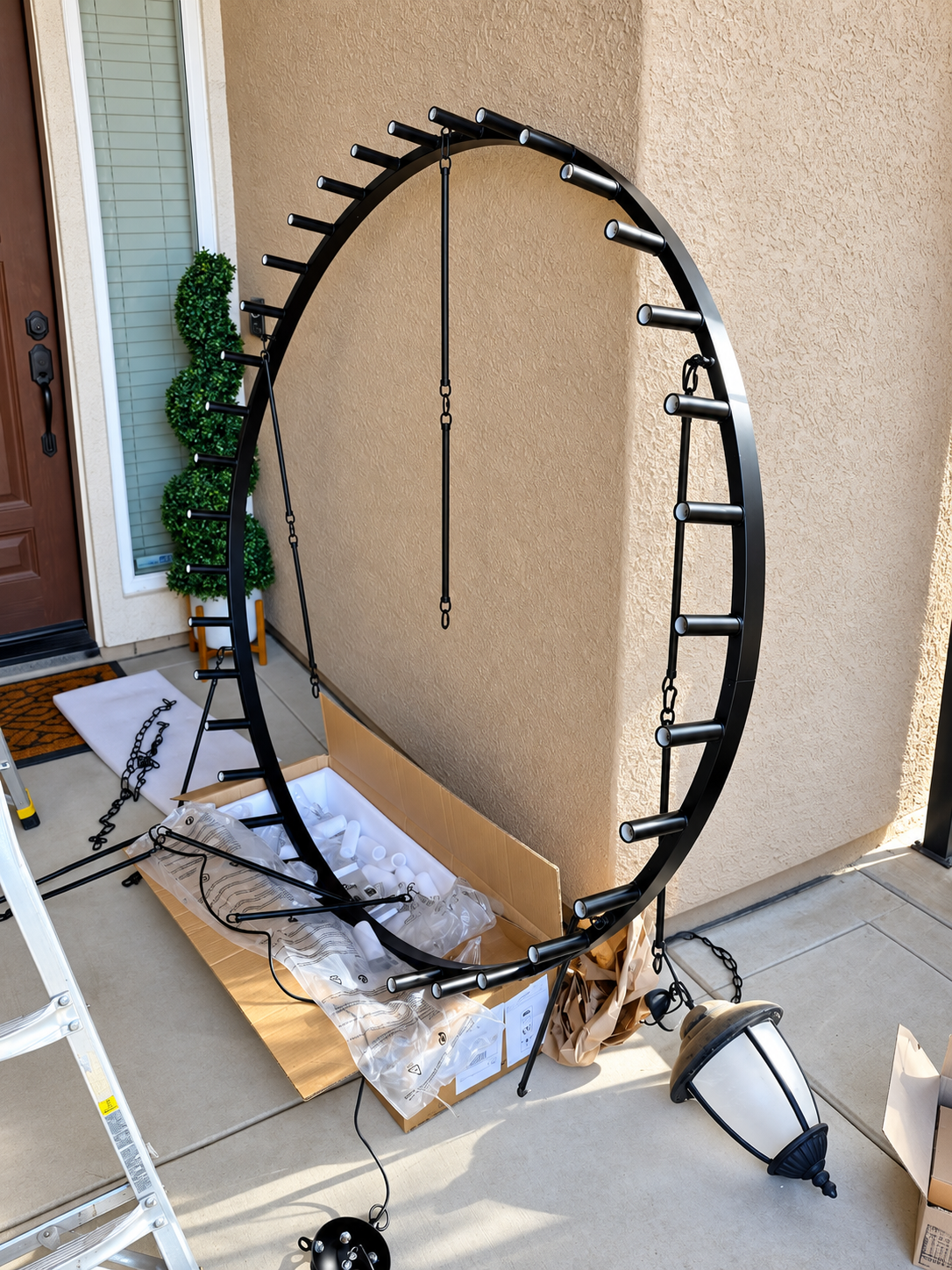 Outdoor entry chandelier assembly for Yuba City installation by I Build Energy