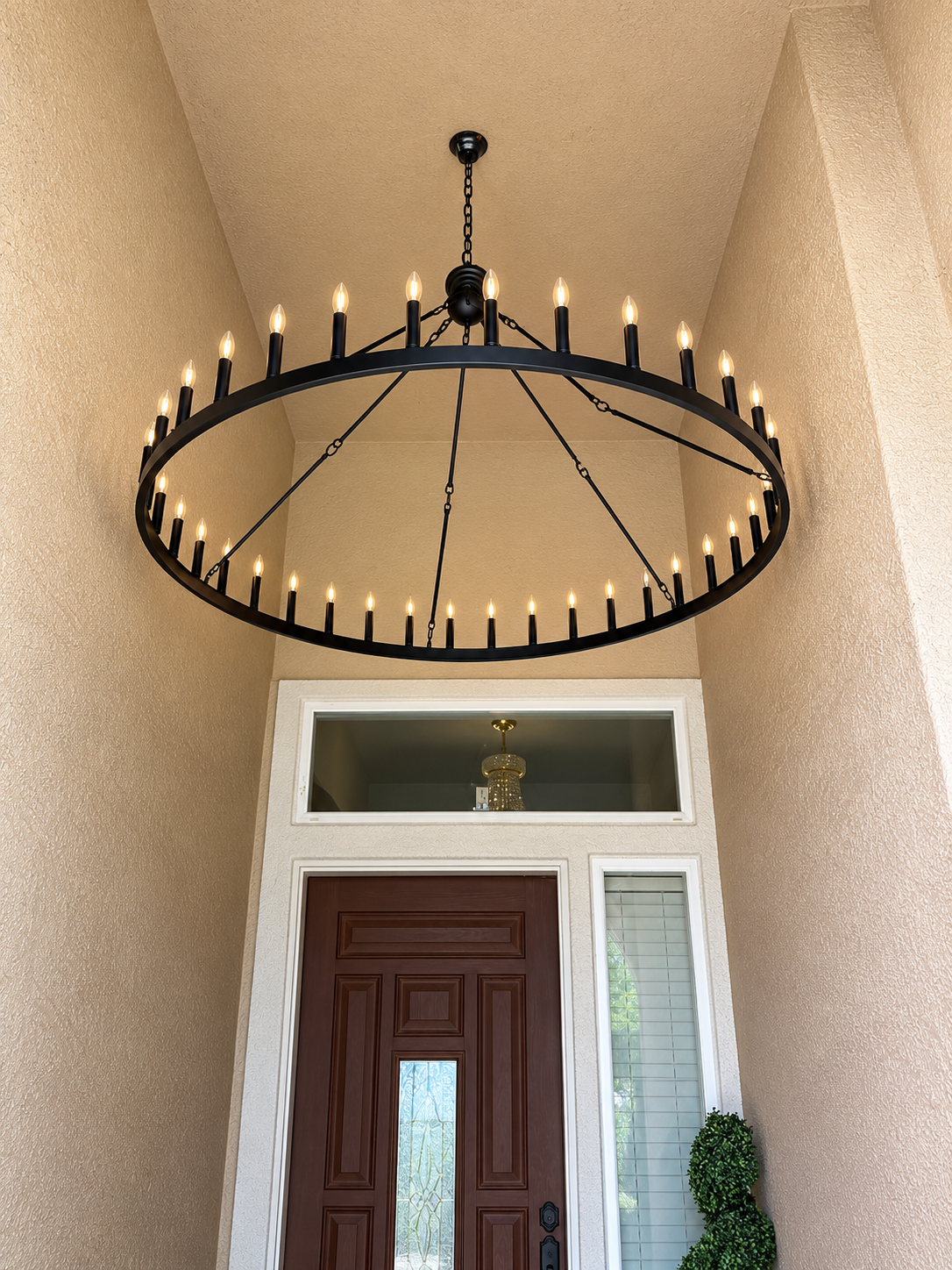 Completed outdoor entry chandelier installation in Yuba City, California