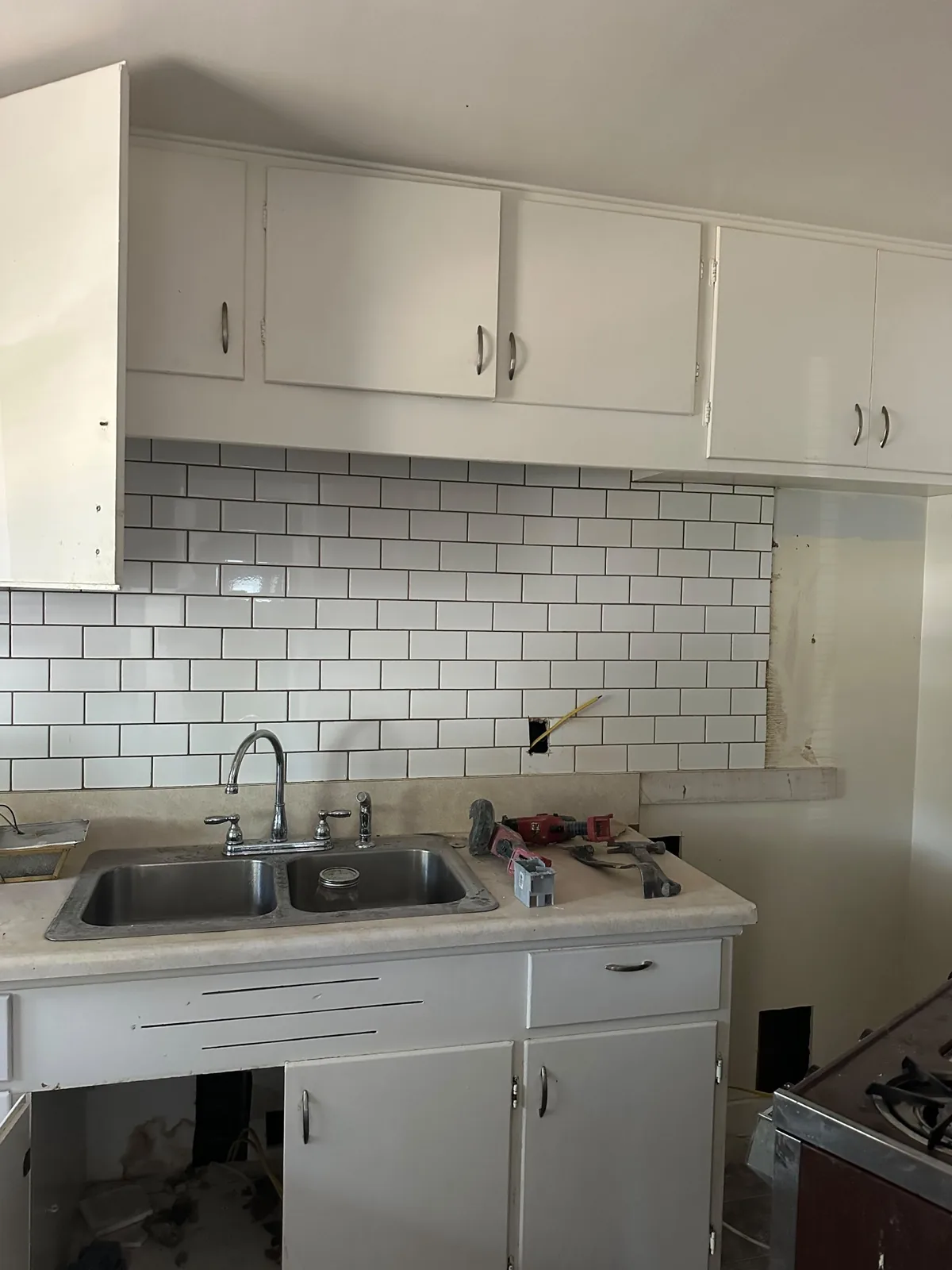 Kitchen electrical wiring replaced during older home rewiring in Davis